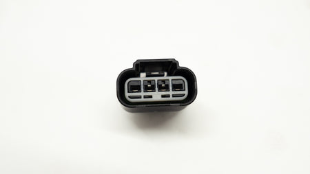 Automotive wiring connector on a white background