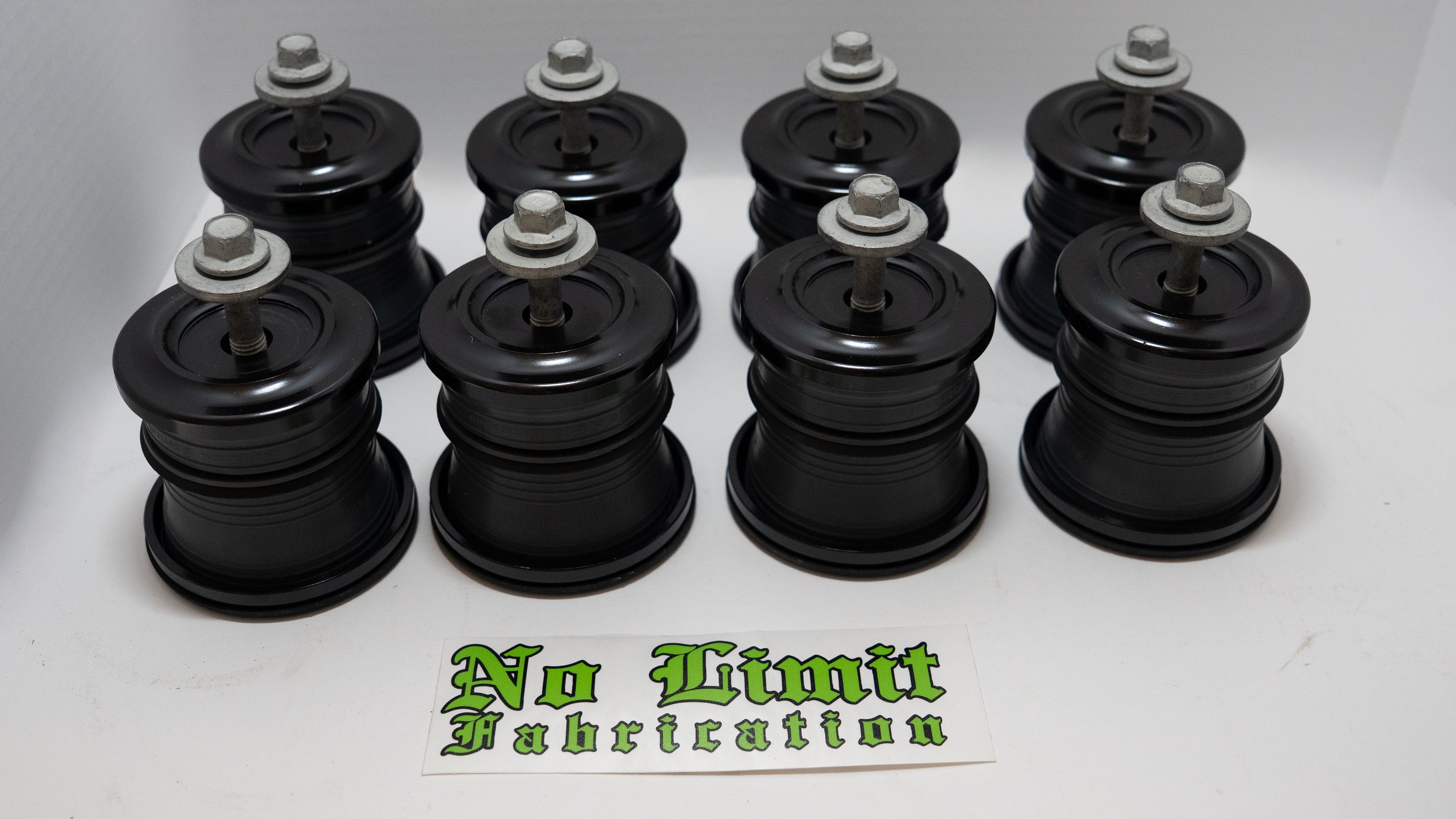 Set of black truck body mount components on a white background with 'No Limit Fabrication' branding.