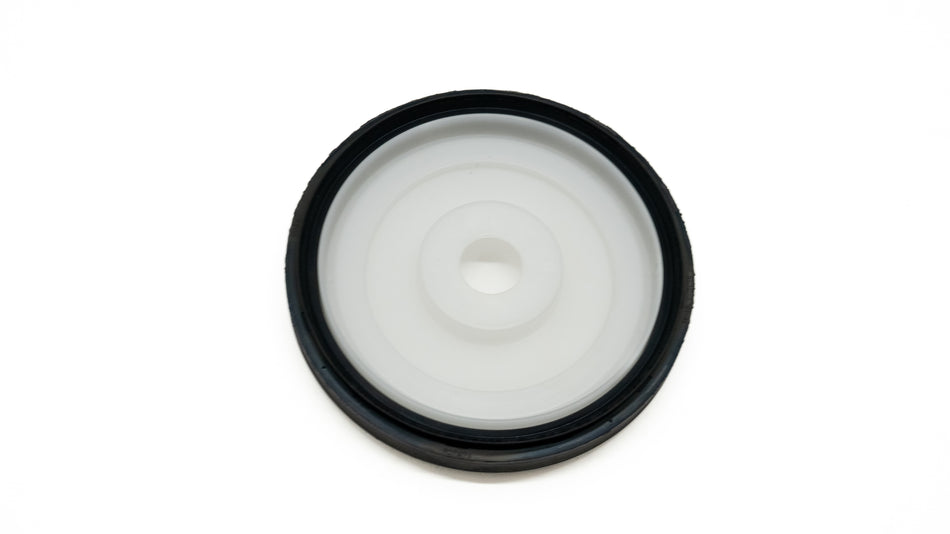 Black circular seal with white center on a white background