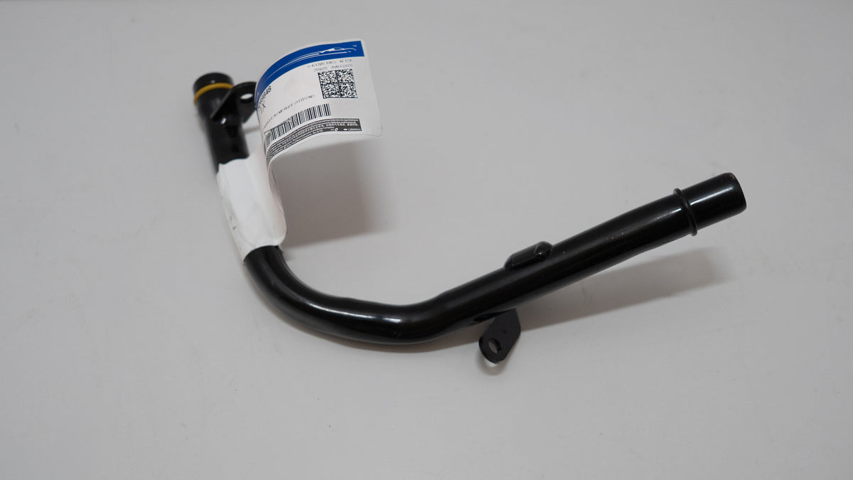 Black automotive pipe with a white  label on a white background