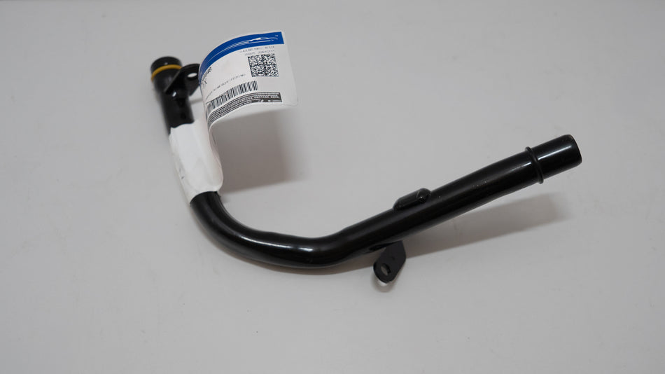 Black automotive pipe with a white  label on a white background