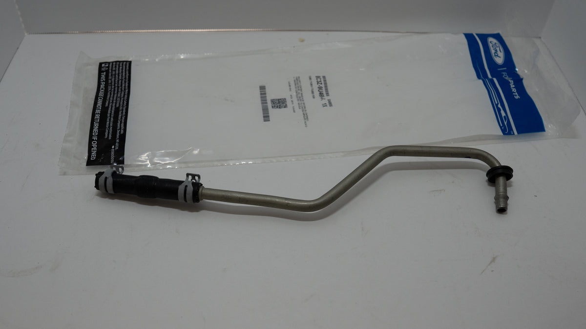 Metal water pipe hose with connectors on a white background