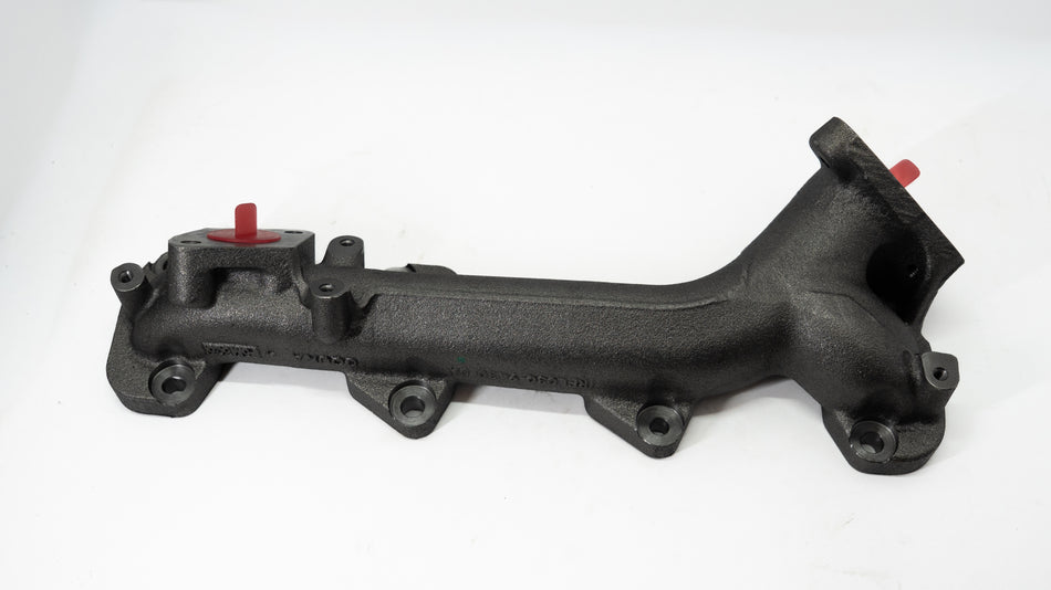 Black metal automotive pipe on a white background