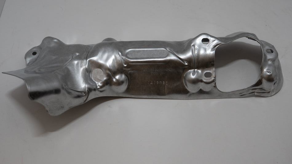 Metallic automotive metal plate on a white background.