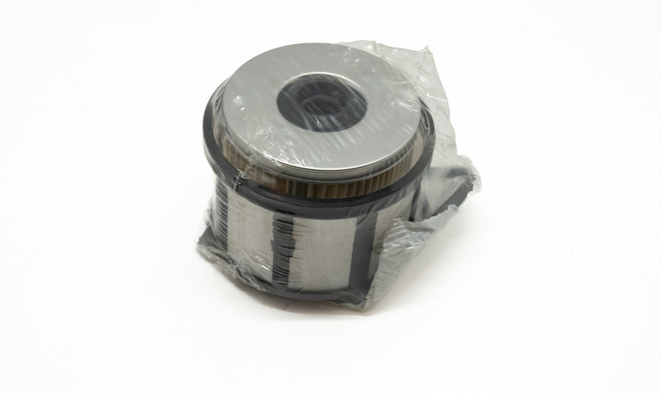Automotive fuel filter wrapped in plastic on a white background