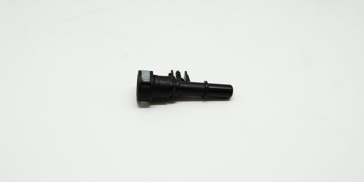 Black plastic mechanical component on a white background