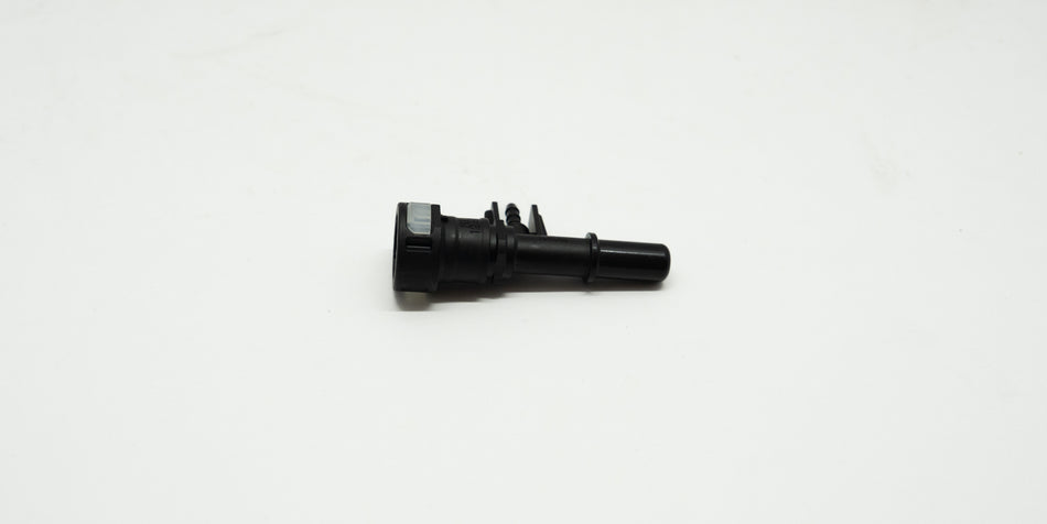 Black plastic mechanical component on a white background