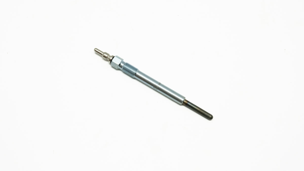 Metallic cylindrical object on a white background
