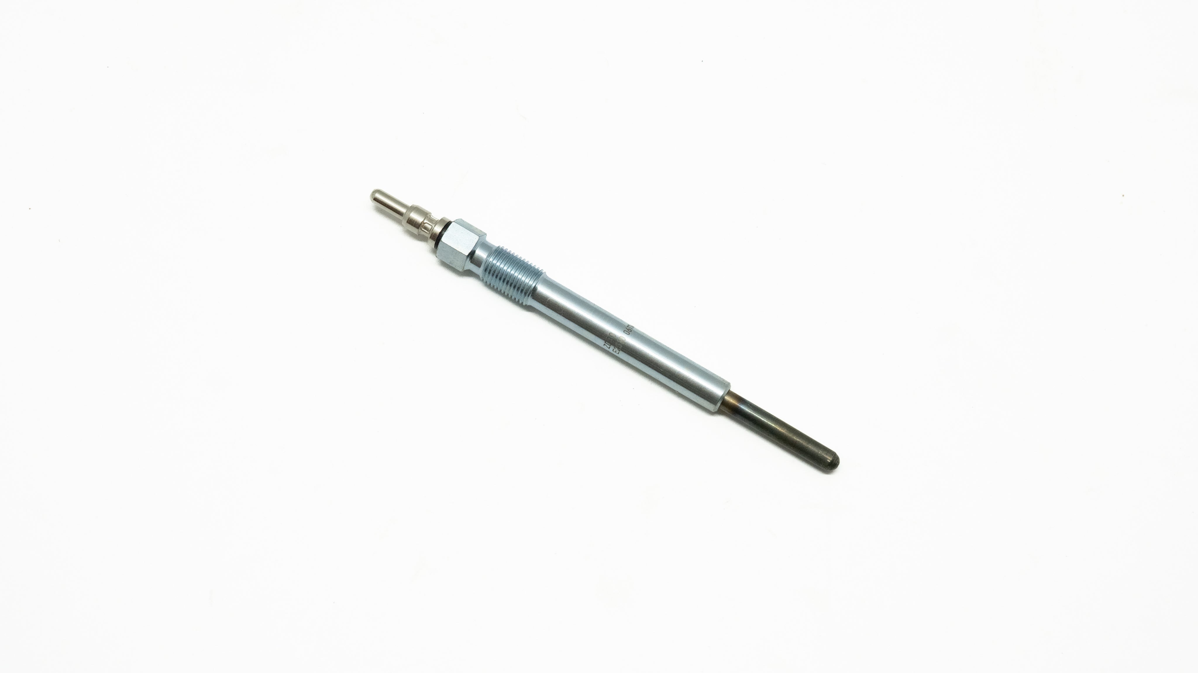 Metallic cylindrical object on a white background