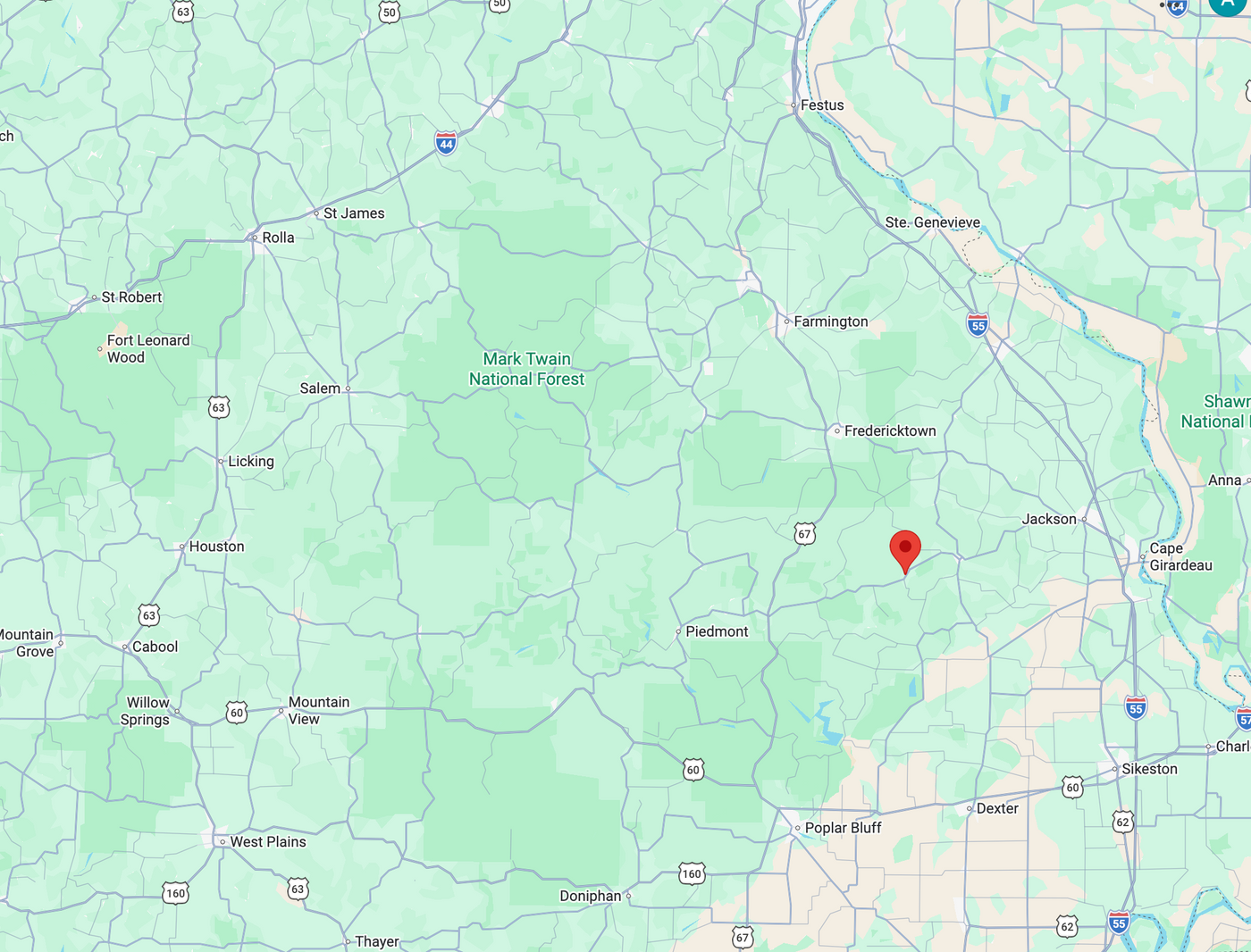 Map of a region with a red marker indicating the specific location for Cook Automotive.