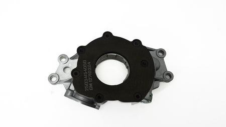 Automotive oil pump on a white background