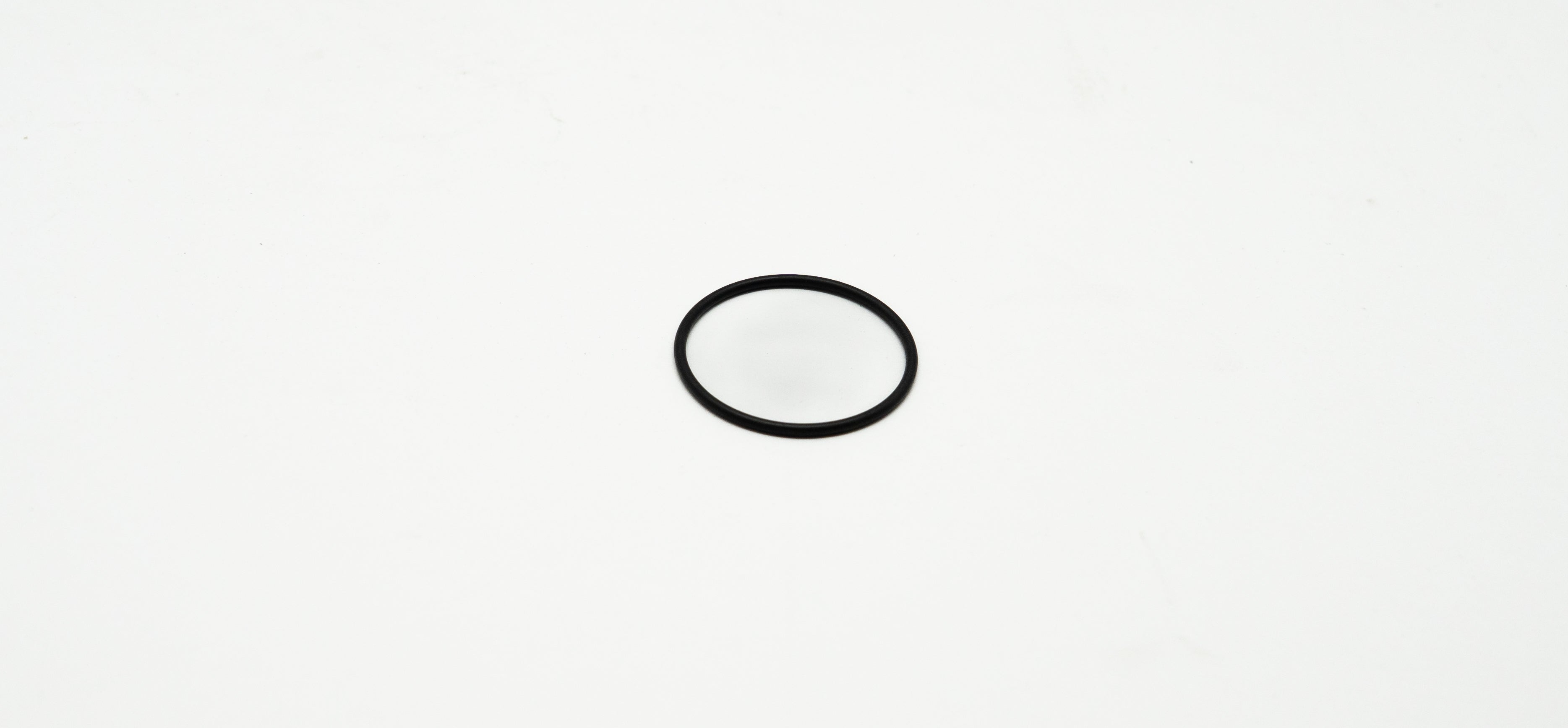 Black circle rubber seal on a white background