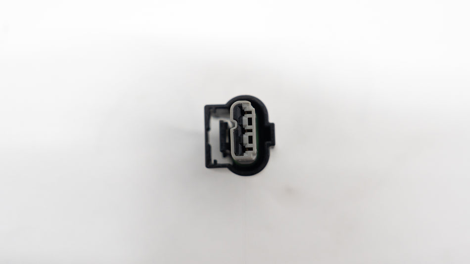 Black wire connector for auto on a white background