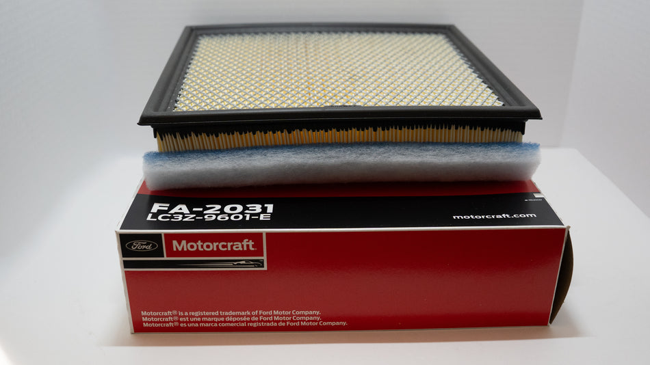 Motorcraft engine air filter with packaging on a white background