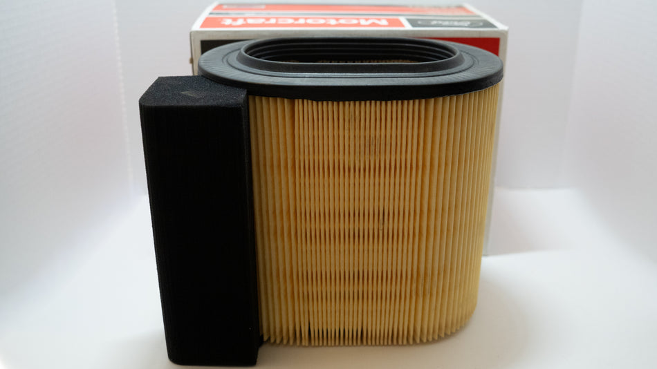 Engine air intake filter and assembly with packaging on a white background.