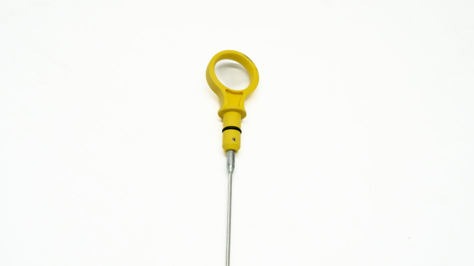 Yellow oil dipstick on a white background