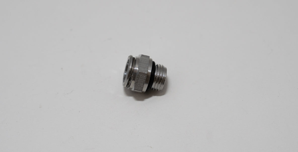 Automotive metal fitting on a white background