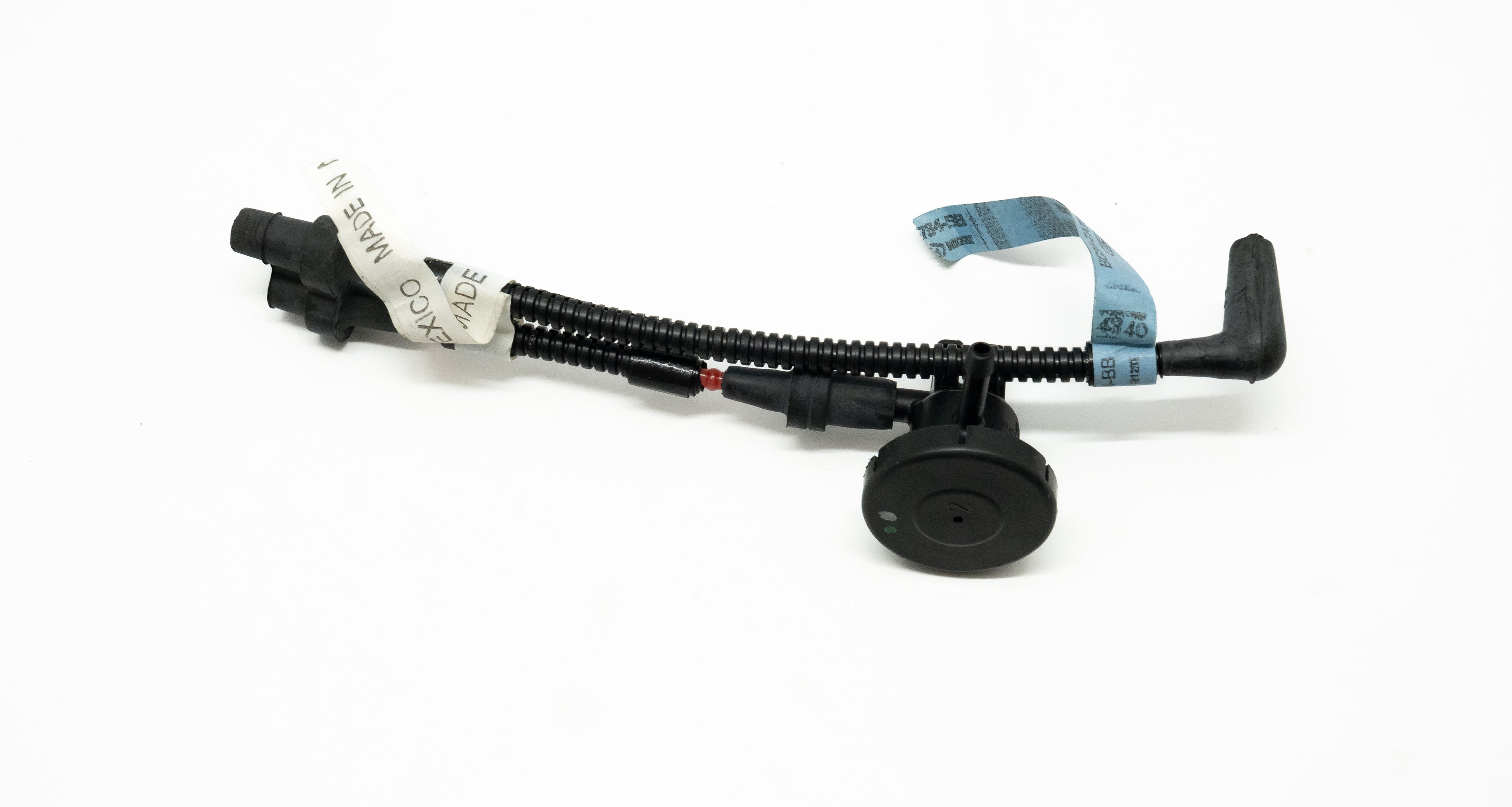 Mechanical component with tubing and connectors on a white background