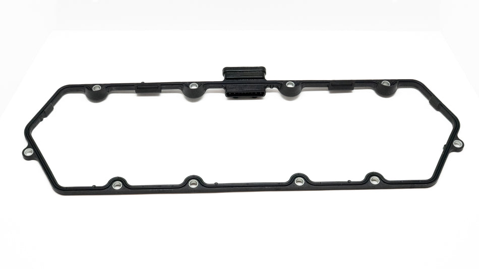 Black oil pan gasket on a white background