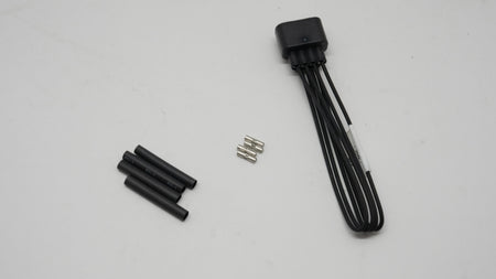 Black electronic components wiring and connectors on a white background
