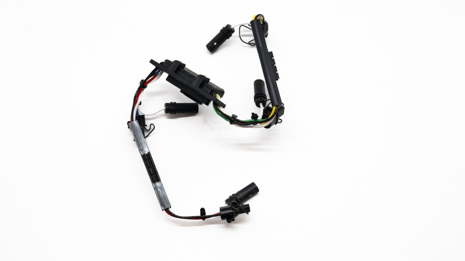 Automotive wiring harness on a white background