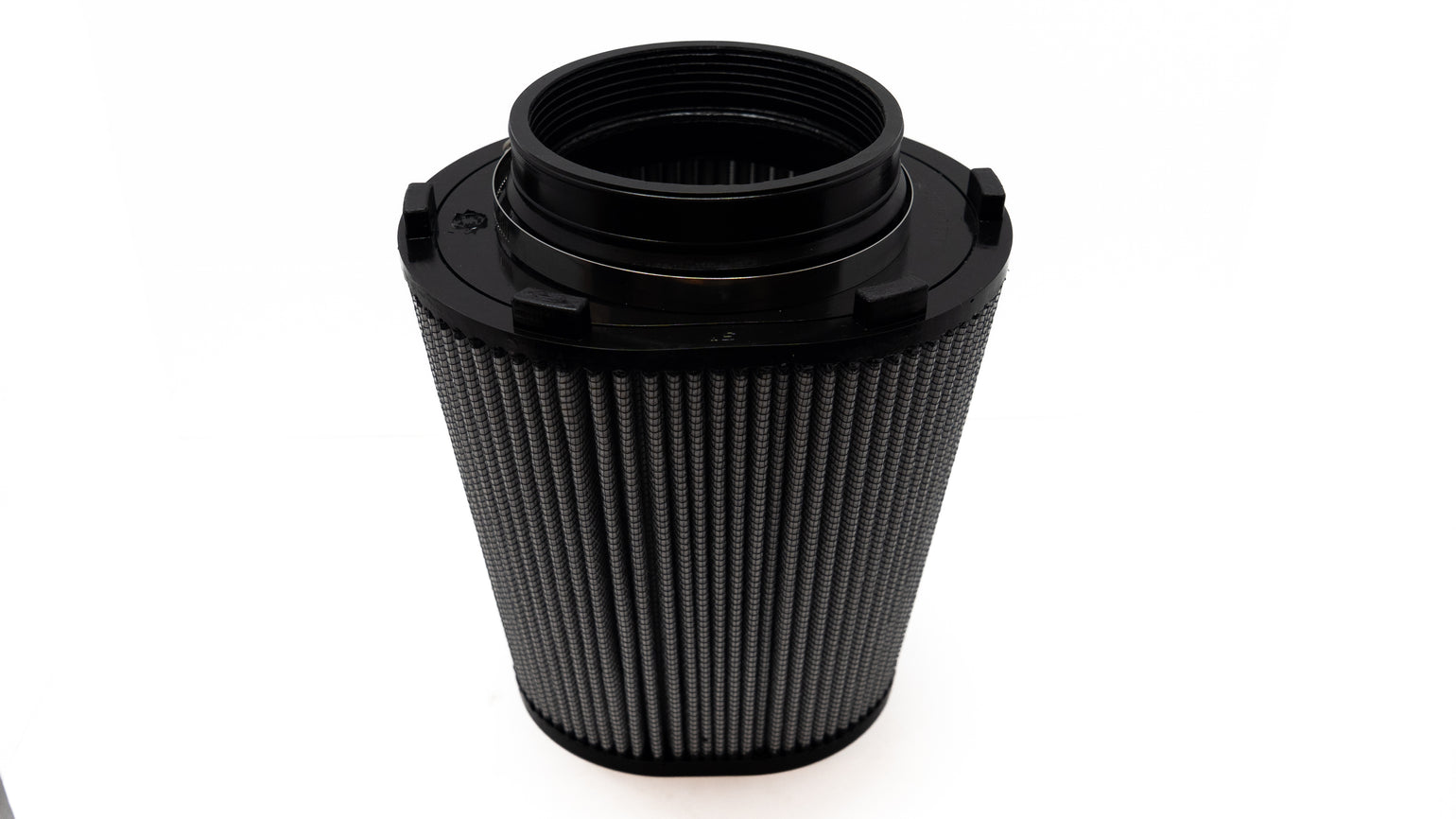 aFe auto brand cone shaped air filter with white background. 