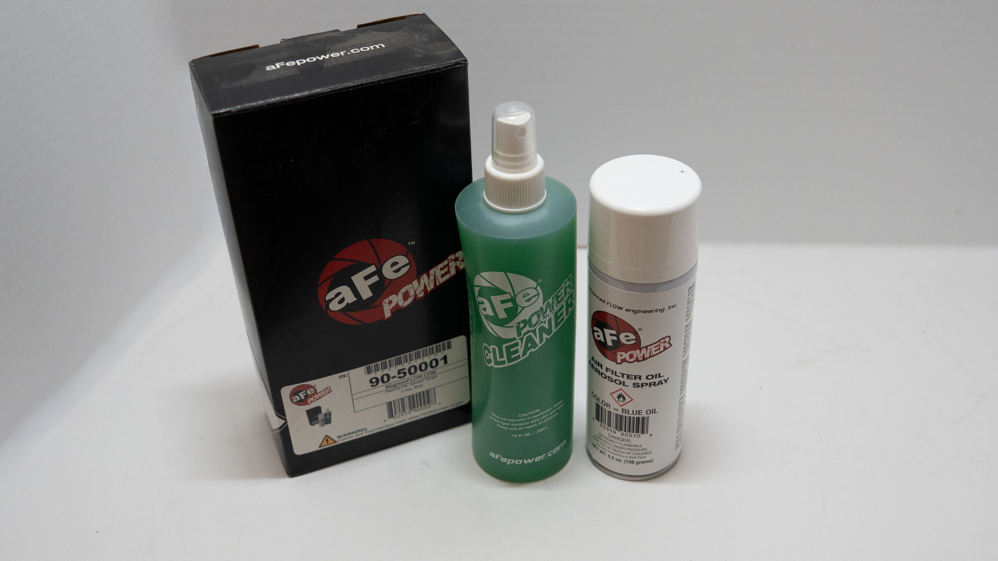 aFe Power products including a box, cleaner, and spray can on a white background